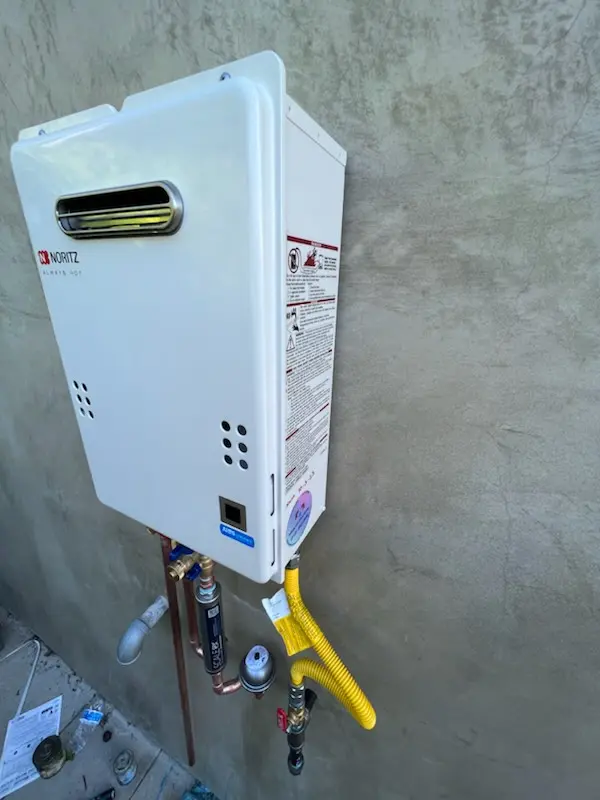 Tankless water heater installation for Marnett homes